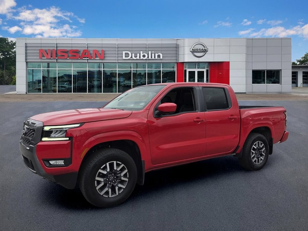 2025 Nissan Frontier Crew Cab SL 4x4 in Red — front three-quarter view