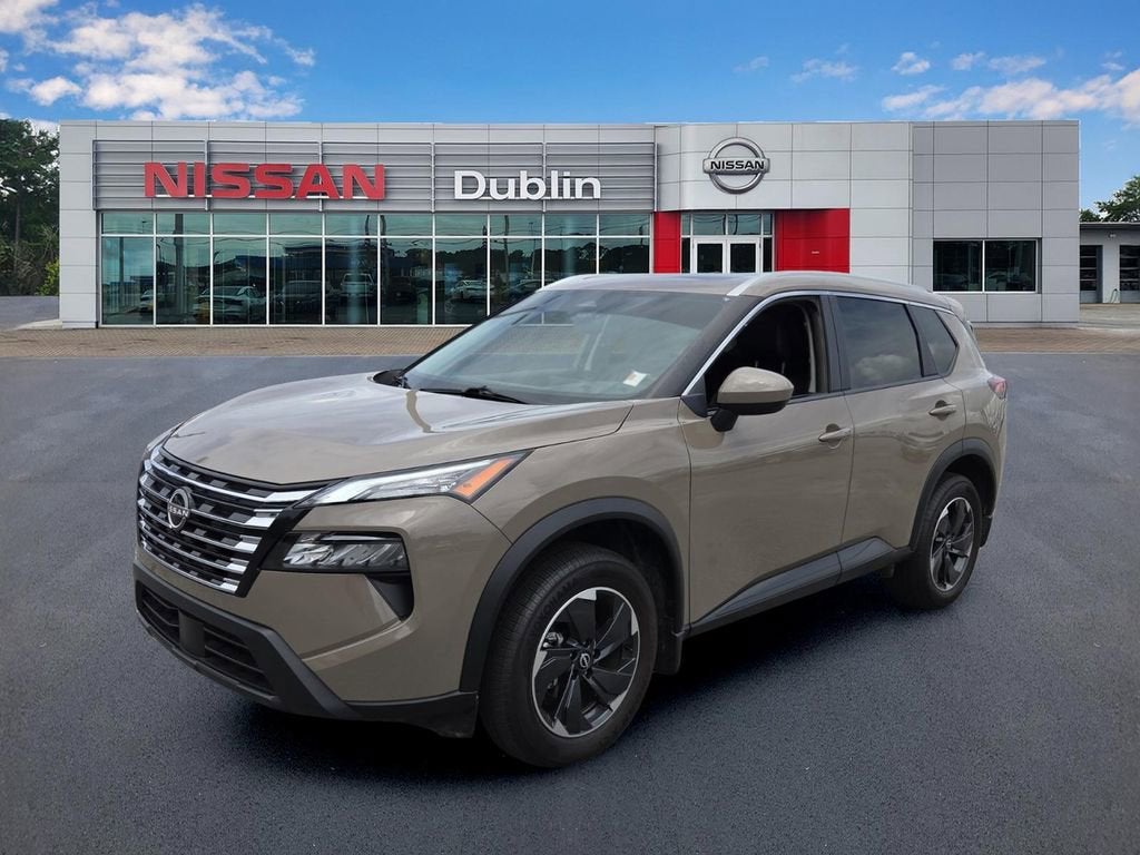 2025 Nissan Rogue SV FWD in Beige/Tan — front three-quarter view